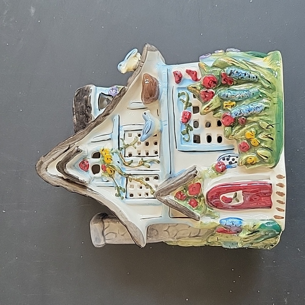 Blue Sky ceramic Garden Cottage t-lite holder. Heather Goldminc 2009